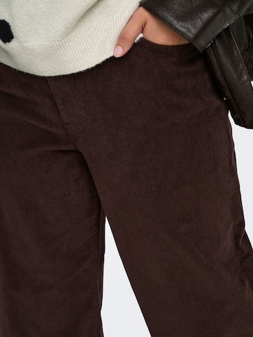 ONLY Carmakoma - Pierna ancha Pantalón 'CARHope' en marrón