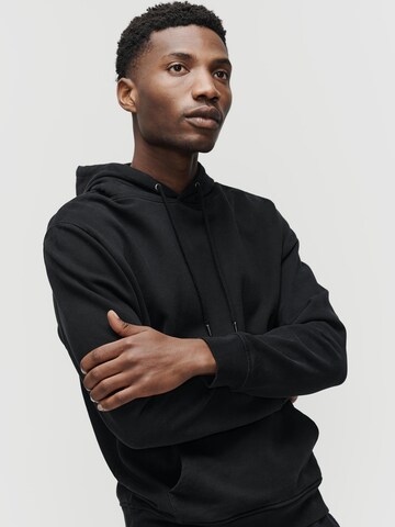 SANVT Sweatshirt 'The Hooded Sweatshirt' in Black: front