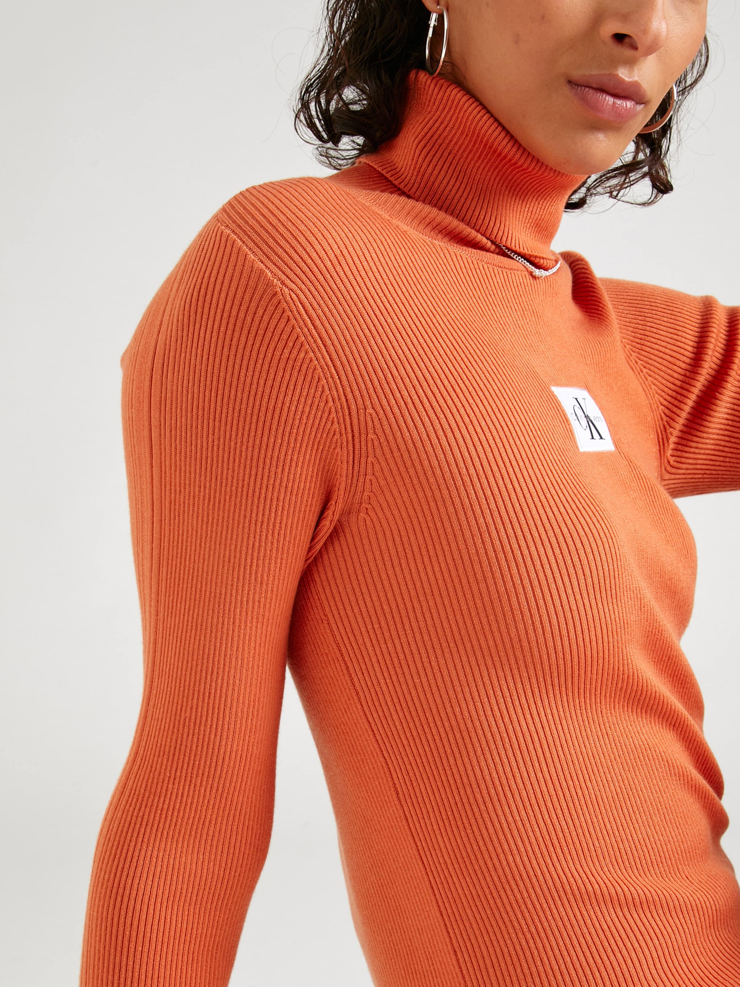 Calvin klein on sale orange jumper