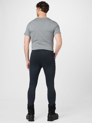 PEAK PERFORMANCE Skinny Sports trousers 'Rider' in Black