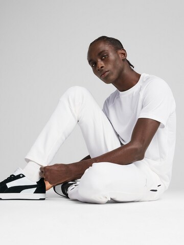 Maglia funzionale 'EVOSTRIPE' di PUMA in bianco