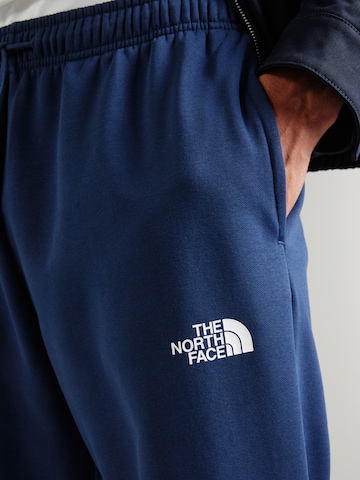 THE NORTH FACE Дънки Tapered Leg Панталон 'SIMPLE DOME' в синьо