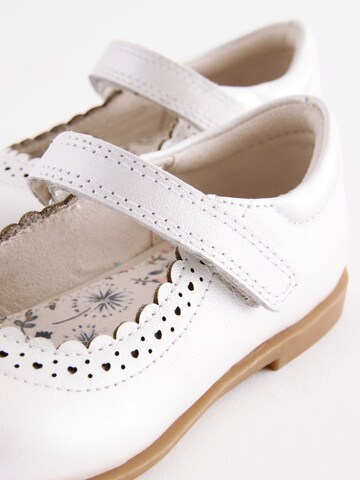 Next - Bailarina en blanco