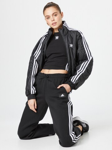 ADIDAS SPORTSWEAR Tapered Workout Pants 'Future Icons 3-Stripes' in Black
