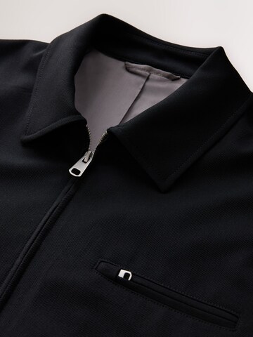 Next Between-Season Jacket 'Motionflex' in Black