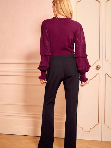 Wide leg Pantaloni con pieghe di love & roses in nero