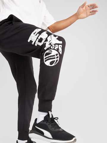 Effilé Pantalon de sport 'Posterize 2.0' PUMA en noir