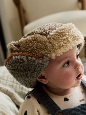 Căciulă de la Next pe bej: față