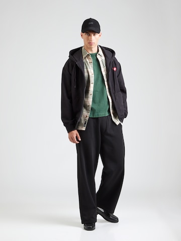 WEEKDAY Loosefit Housut värissä musta