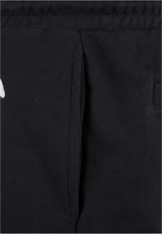 regular Pantaloni di Karl Kani in nero