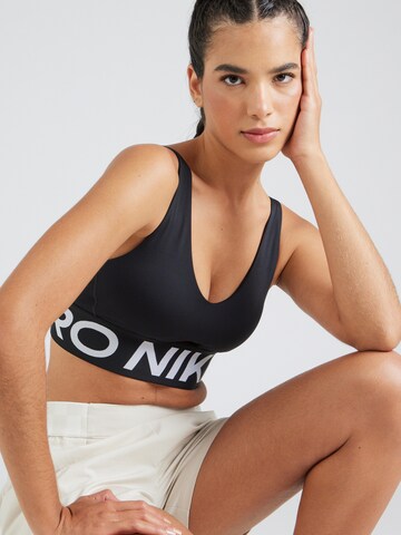 NIKE Bralette Sports bra 'Indy' in Black