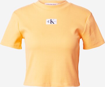 Maglietta di Calvin Klein Jeans in arancione: frontale