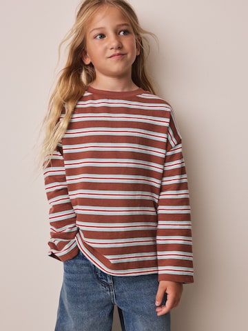 Next T-shirt i brun: framsida