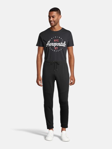 AÉROPOSTALE - Tapered Pantalón en negro