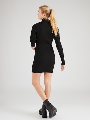 Trendyol Úpletové šaty – černá