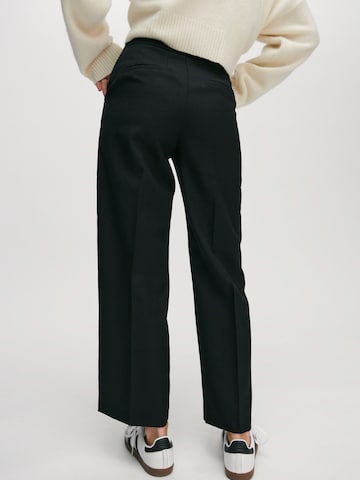 ABOUT YOU x Marie von Behrens Wide leg Pants 'Philine' in Black