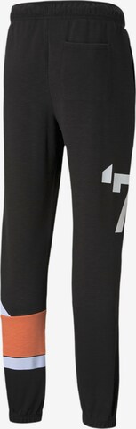 PUMA Tapered Sportbroek in Zwart