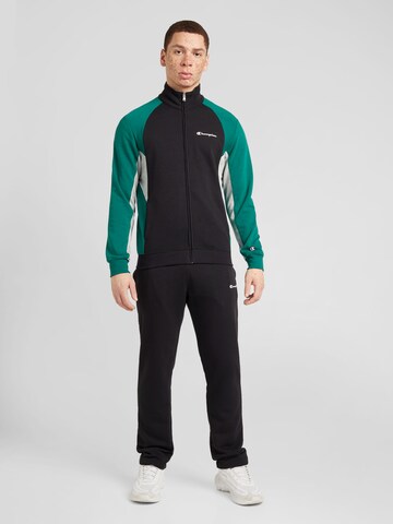 Champion Authentic Athletic Apparel Tracksuit in Black: front