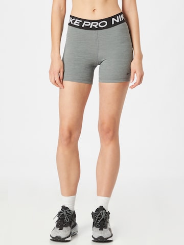NIKE - Skinny Calças de desporto 'Pro 365' em cinzento: frente
