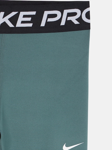 NIKE Skinny Sportsbukser 'Pro' i grøn