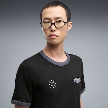 T-Shirt fonctionnel 'FUTURE.ARCHIVE' PUMA en noir : devant