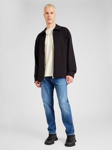 Tommy Jeans Štandardný strih Džínsy 'DAD TAPERED' - Modrá
