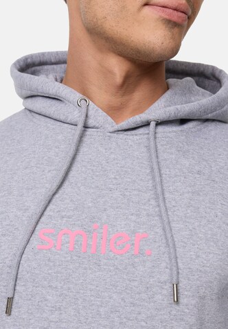 Sweat-shirt smiler. en gris