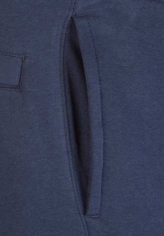 NIKE Tapered Sporthose 'Club19 CFD' in Blau