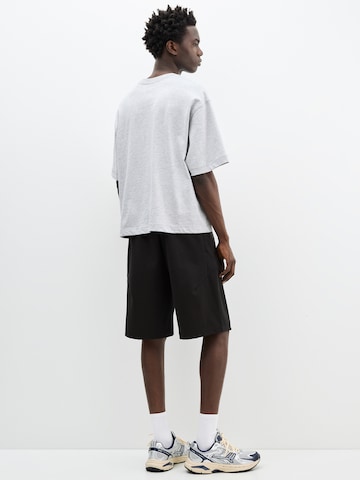 Pull&Bear Zvonové kalhoty Kalhoty – černá