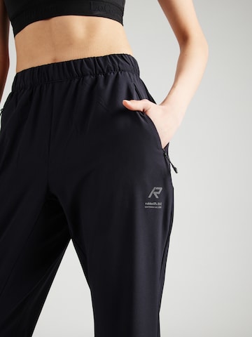 Effilé Pantalon de sport 'MEUVO' Rukka en noir