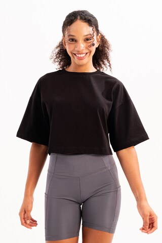 T-shirt Justever en noir : devant