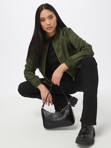 ABOUT YOU Between-Season Jacket 'Chani' in Green