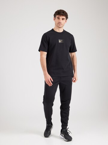 Tricou de la Nike Sportswear pe negru