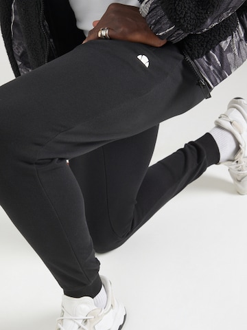 ELLESSE Tapered Sports trousers 'Berlingo' in Black