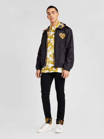 Versace Jeans Couture - Slimfit Calças de ganga '76UP508' em preto