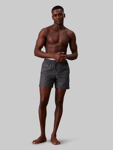 Calvin Klein Swimwear Badeshorts 'META LEGACY' in Grau