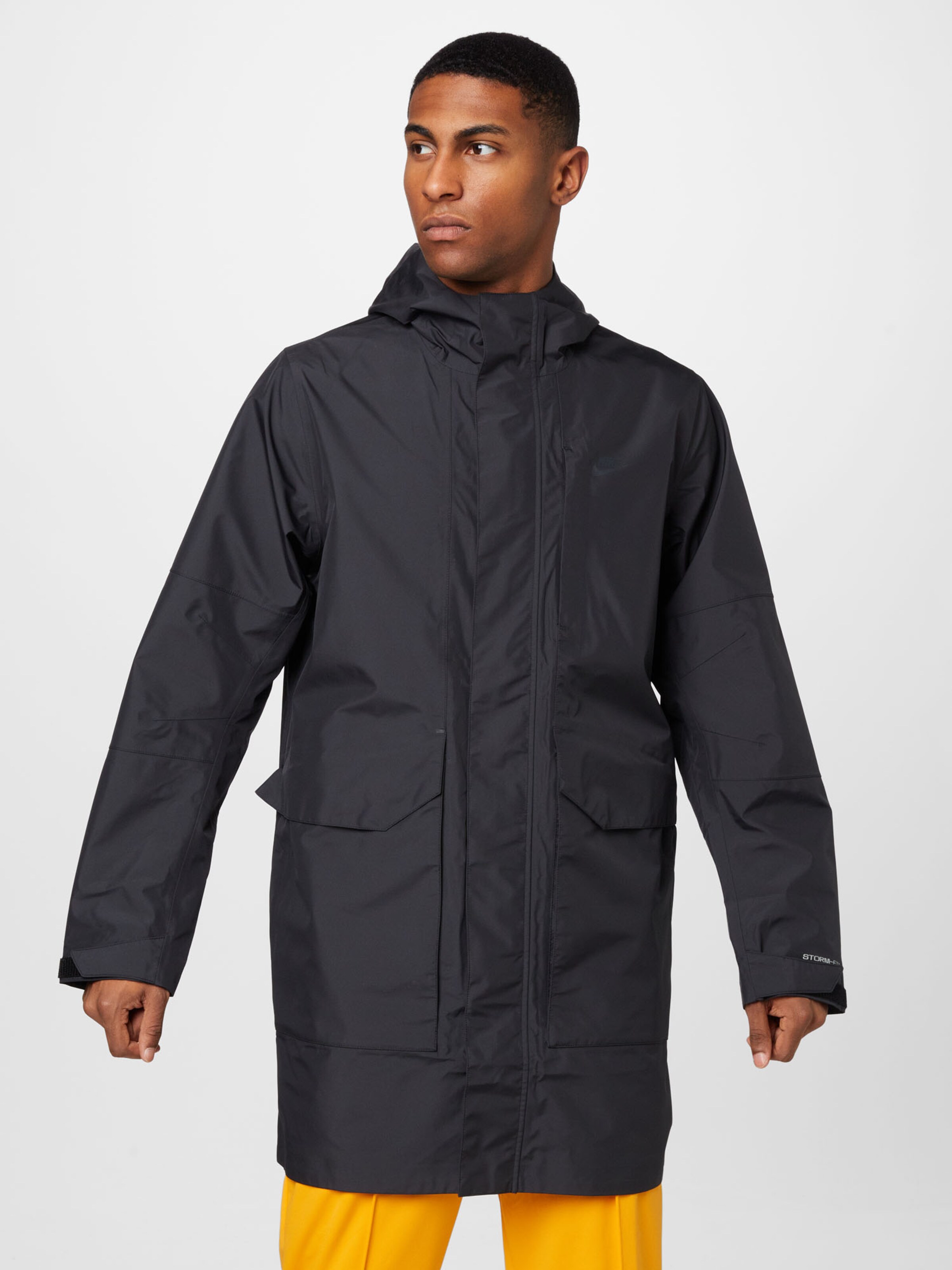 Nike Sportswear Between Seasons Parka in Black ABOUT YOU