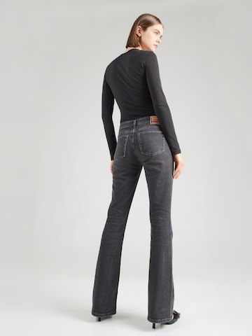 DIESEL Bootcut Jeans '1969 D-EBBEY' in Schwarz