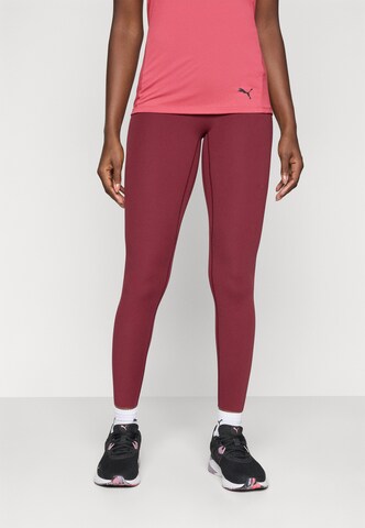 PUMA Skinny Sports trousers in Red: front