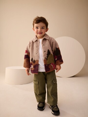 Next Fleecetakki värissä beige