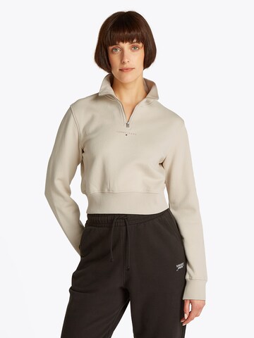 Tommy JeansSweater majica - bež boja: prednji dio