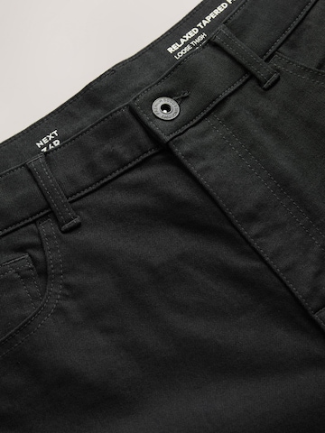 Next Tapered Jeans i sort