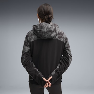Veste de sport 'Run Brightstride' PUMA en noir