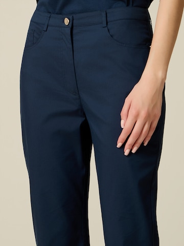 Skinny Pantalon oltre en bleu