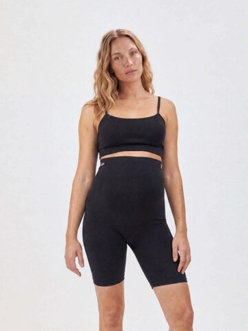 SNOCKS Slimfit Sportbroek in Zwart: voorkant