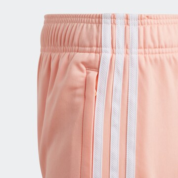 Tapered Pantaloni di ADIDAS ORIGINALS in rosa