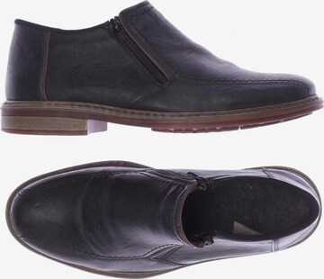 Rieker Flats & Loafers in 41 in Black: front