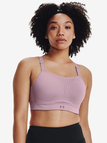 UNDER ARMOUR Bustier Sport bh 'Rush' in Roze: voorkant
