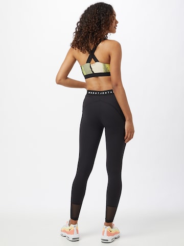 Skinny Pantalon de sport 'Naka' MOROTAI en noir