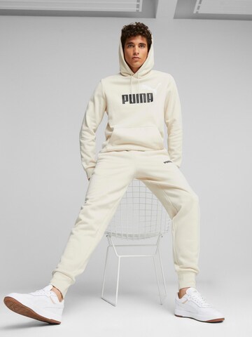 Tapered Pantaloni sport 'ESS+' de la PUMA pe alb